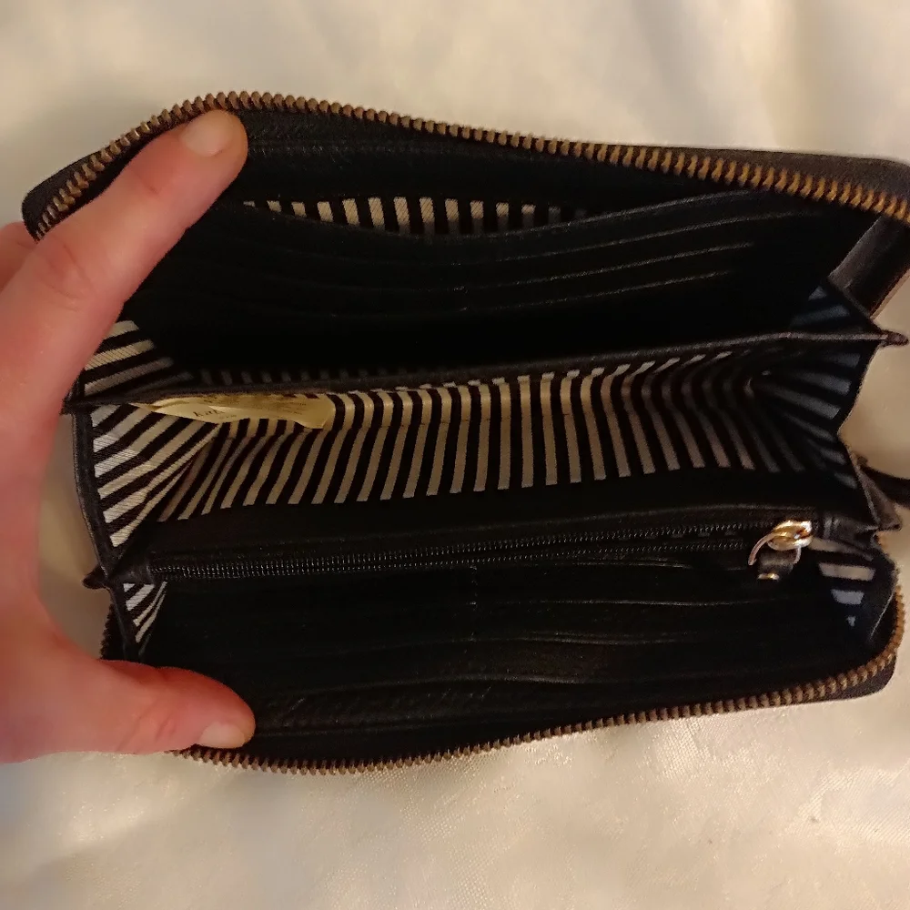 Kate spade black pebbled leather zip around clutch wallet